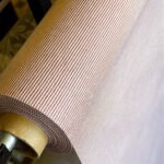 TELA MANTEL ANTIMANCHAS POR MEDIO METRO - LINES CORAL ROJO